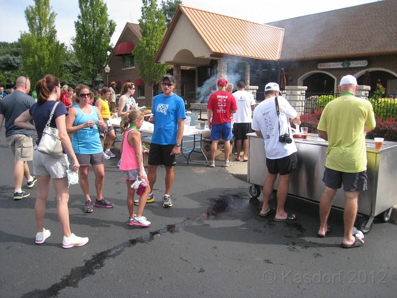 2012 Milford 30K 145.jpg - The Milford 30K Labor Day Race covers it all. Road through town, dirt road through woods, hills, heat, and a good hamburger at the end!